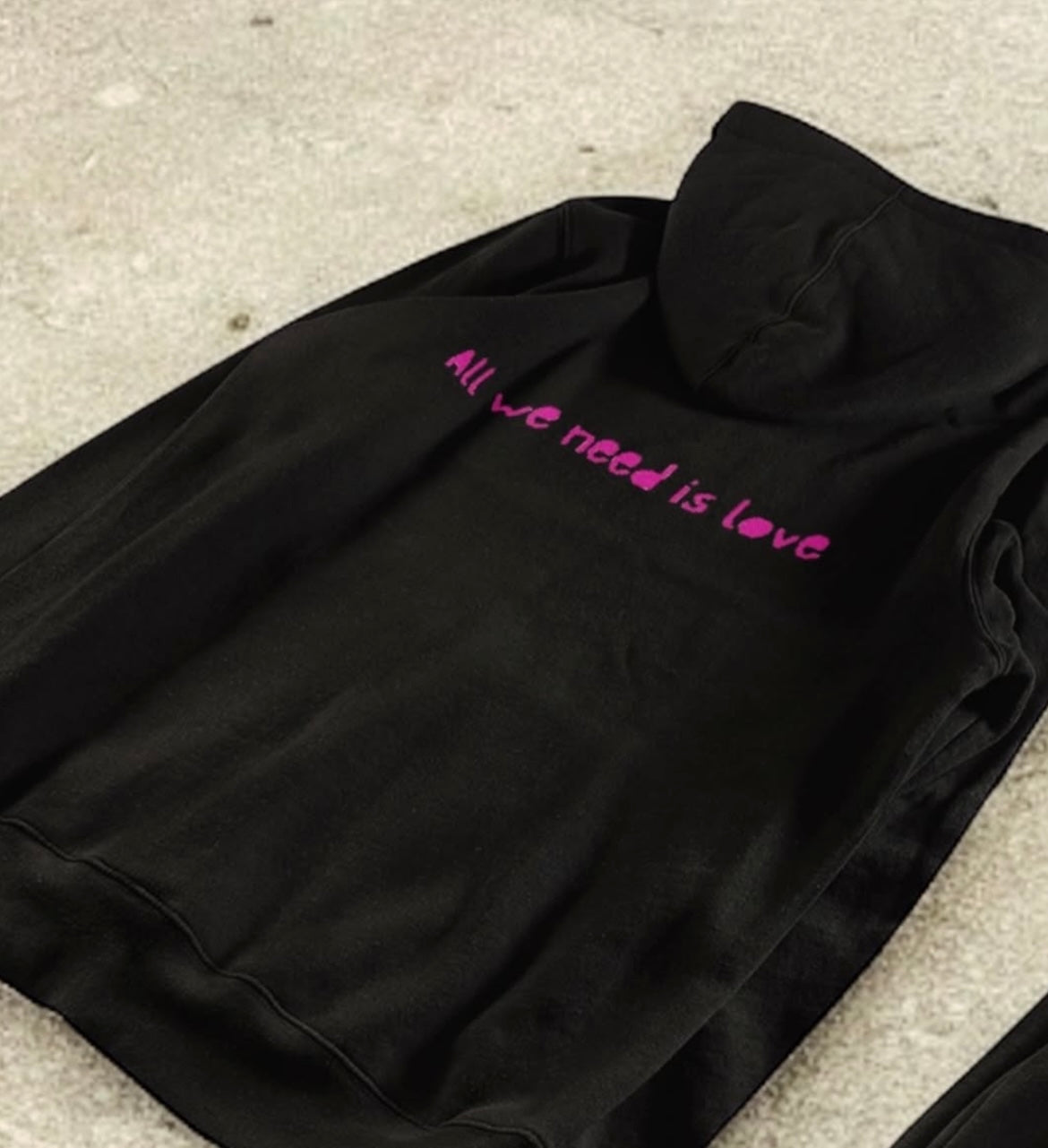 ALL WE NEED IS LOVE HOODIE